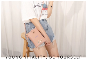 Pink PU leather mini phone bag featuring cactus embroidery and Go Away text detail