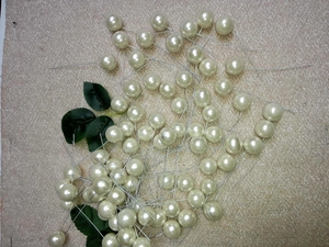 Close-up of 15mm white pearl berry picks for DIY Christmas tree and wedding decoration
