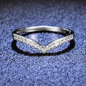 Macro shot of V-shaped S925 sterling silver ring with sparkling micro-pave stones