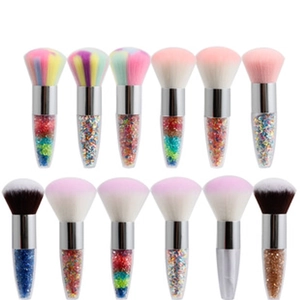 Detail showing 12 professional makeup brushes with glitter handles and colorful bristles
