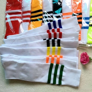 Colorful knee-high soccer socks for adults and kids with triple stripes design