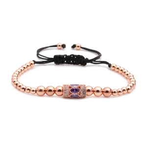 Bracelet ajustable en perles or rose avec zircon violet et cordon tressé noir