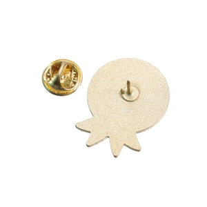 Detailed back view of golden metal medal brooch showing the butterfly clutch pin fastener