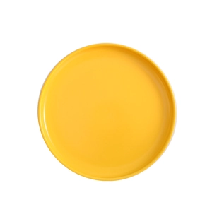 Nordic matte yellow ceramic round dinner plate for steak and home dining on white background