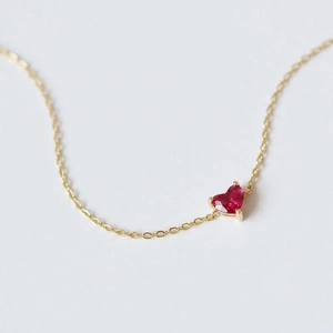 S925 sterling silver 14K gold plated bracelet with a heart-shaped red gemstone