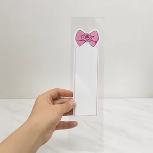 Detailed close-up of a pink floral hair clip display card with Accessories lettering