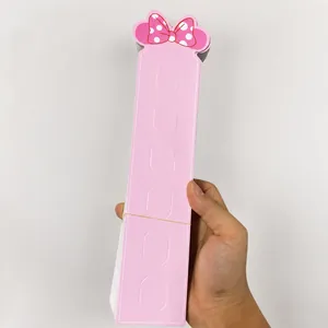Pink cardboard display cards for long hair clips featuring decorative bow detail
