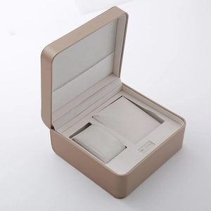 Elegant champagne gold watch and jewelry gift box with soft white interior pillows