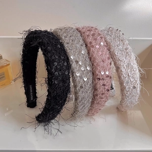 Elegant tweed padded headbands in black, grey, pink, and beige with sequins and fringe decor