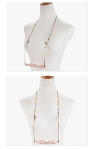 Detail view of colorful beaded eyewear chain with small round beads and metal hooks
