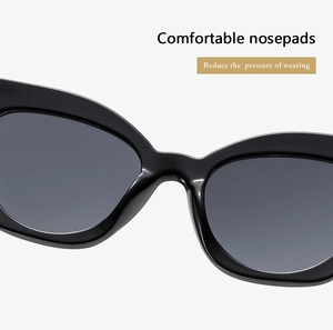 Detail of comfortable integrated nose pads on black cat-eye sunglasses for pressure reduction
