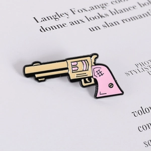 Cute pink and yellow cartoon pistol enamel brooch pin made of metal for daily decoration