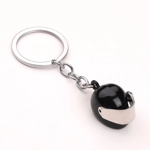 Creative black motorcycle helmet keychain with silver visor and durable metal ring chain