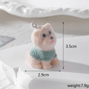 Detail of flocked resin dachshund pendant in green sweater with size and weight info