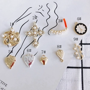 Collection of alloy heart and cross pendants with pearls for DIY jewelry making