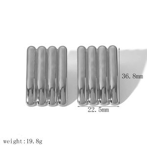 Polished silver geometric ribbed earrings with dimensions 36.8mm height and 22.5mm width