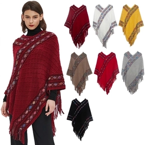 Ethnic knit poncho for women with fringe tassels and geometric patterns in seven colors