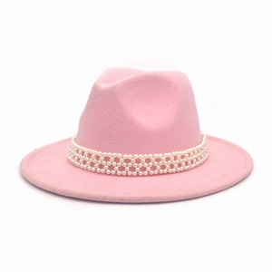 Detailed view of a pink wool felt fedora featuring an elegant pearl beaded mesh headband