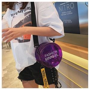 Detail of round purple transparent PVC crossbody bag with white fashion mini girl text