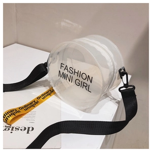 Close-up of circular clear PVC jelly bag with black strap and yellow ribbon detail