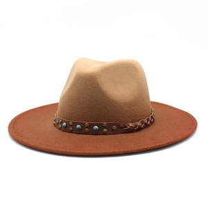Gradient two-tone fedora hat with turquoise studded leather band on white background