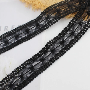 Elegant black lace waist chain with woven fringe tassel and vintage floral braided pattern