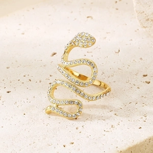 Detailed view of an 18K gold plated stainless steel snake ring with pavé crystals