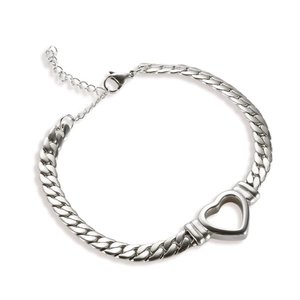 Detail of a titanium steel heart bracelet featuring Cuban links and lobster clasp