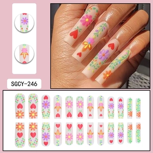 Sunflower and heart pattern matte press-on nails set including various sizes