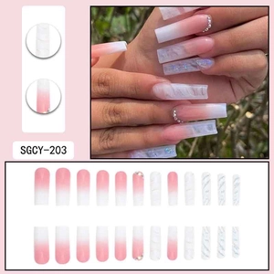Pink and white gradient press-on nails with marble design and rhinestones set