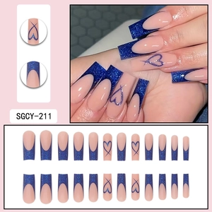 Long trapezoid blue glitter heart press-on nails with naked pink base and French tips
