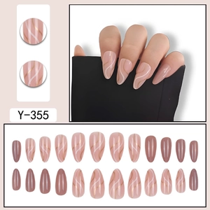 Almond press on nails with nude base and gold wave line patterns in 24 pieces set