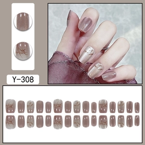 Cat eye short press-on nails with bamboo pattern and nude neutral glitter finish