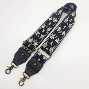Ethnic embroidered navy canvas wide shoulder strap with bronze metal buckles