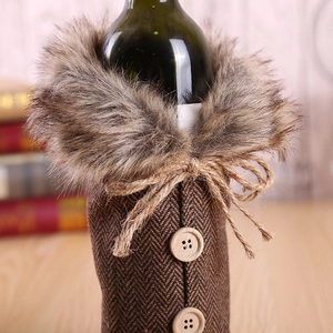 Christmas burlap wine bottle cover with faux fur collar and rustic bow decoration