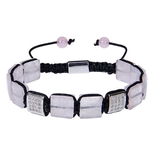 Macro view of woven bracelet with pink square natural stone and silver micro-pave charms