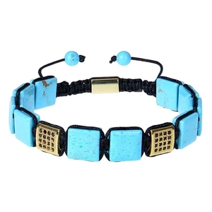 Detail of square blue stone beaded bracelet with gold cubic zirconia micro-pave accents