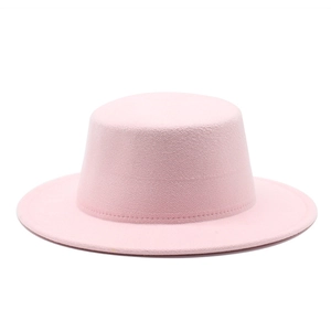 Detail showing the fine wool texture and neat stitching of the pink boater hat brim