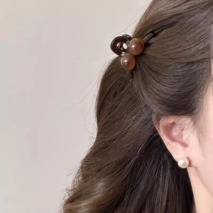 Glossy amber cherry hair claw clip in resin for women elegant half-up hair accessory