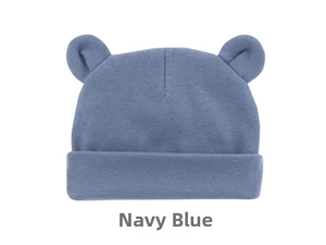 Close-up of baby knit beanie with Mickey ears in navy blue cotton fabric