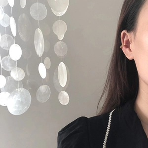 Minimalist beaded 18K gold plated stainless steel ear cuff earring on model's ear