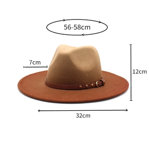 Detail view of bicolor fedora hat with 7cm brim, 12cm crown, and studded leather band