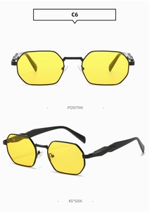 Detail view of model C6 retro hexagonal sunglasses with black metal frame and yellow lens