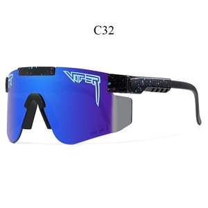 Detail view of AVIP sports sunglasses featuring blue reflective lenses and paint-splattered frame