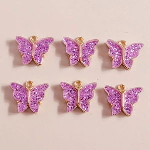 Set of six purple sequin acrylic butterfly pendants with gold metal edges for DIY jewelry