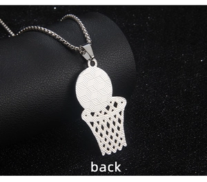 Macro view of stainless steel basketball hoop pendant back with geometric texture