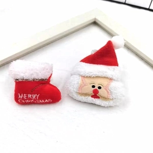 Christmas plush accessory set with Santa Claus head and embroidered red stocking