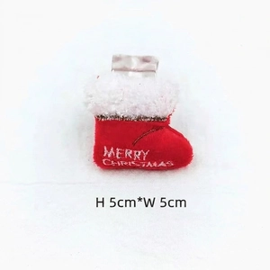 Close-up of 5x5cm mini plush Christmas stocking pin with Merry Christmas embroidery