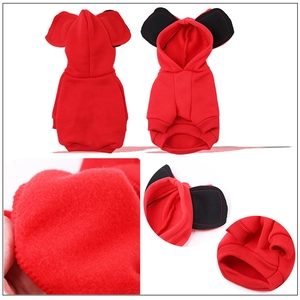 Detail of red fleece pet hoodie showing soft fabric texture and hooded design with ears