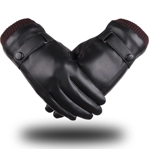 Close-up of men's black PU leather gloves with red-brown knit cuffs and strap detail